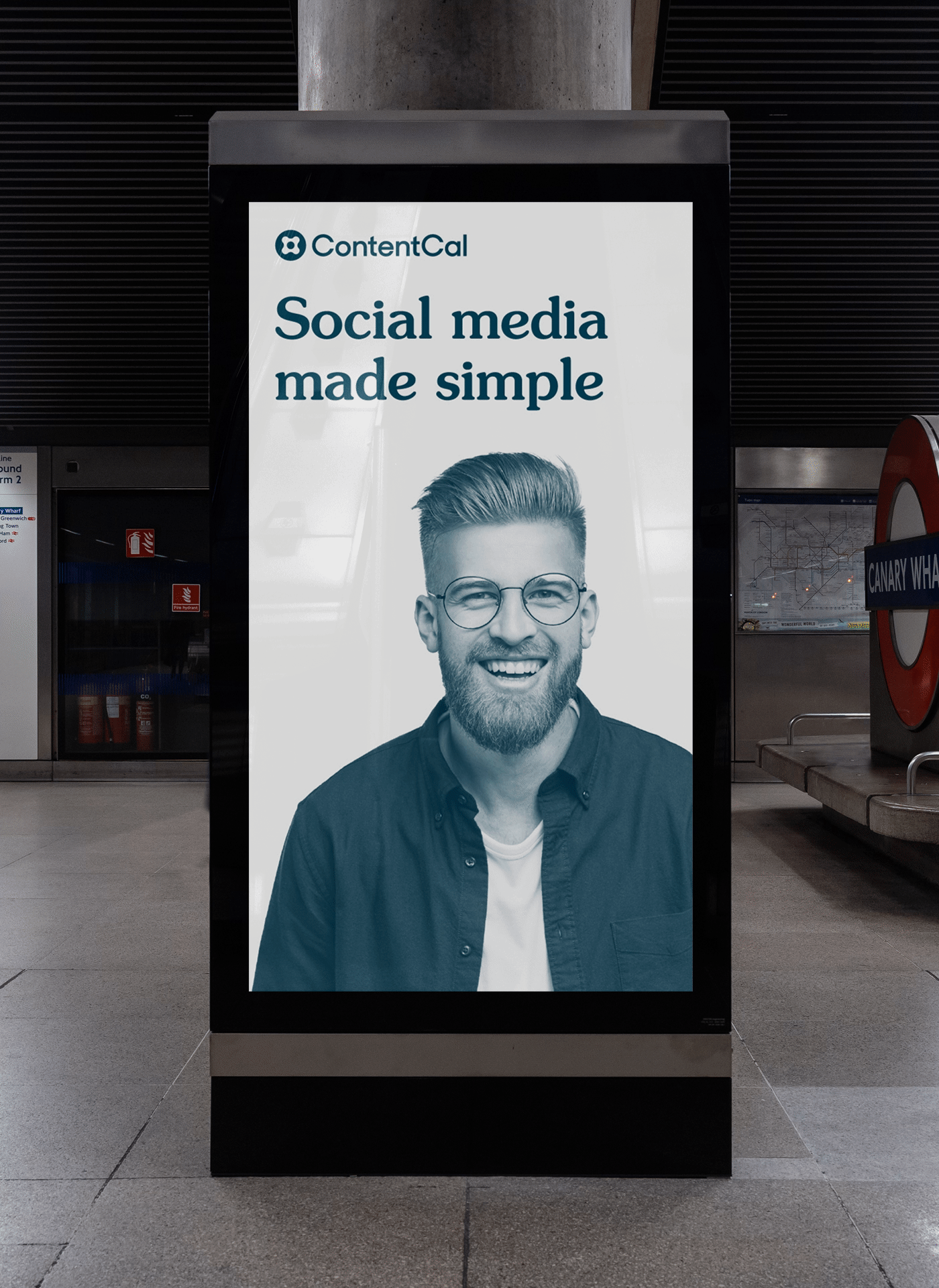 ContentCal tube station digital billboard — Social media made simple